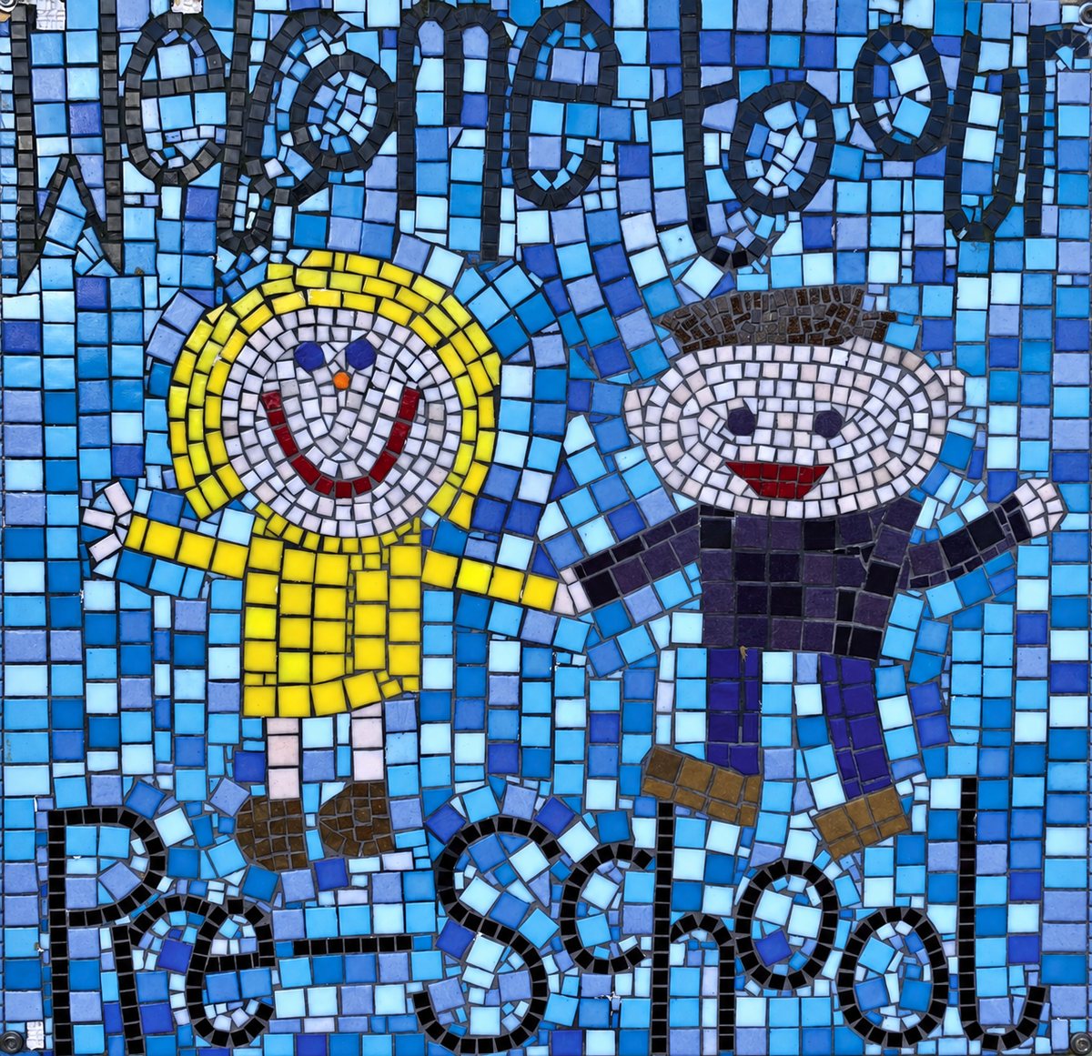 A mosaic made by the children reading Welcome to our Pre-School