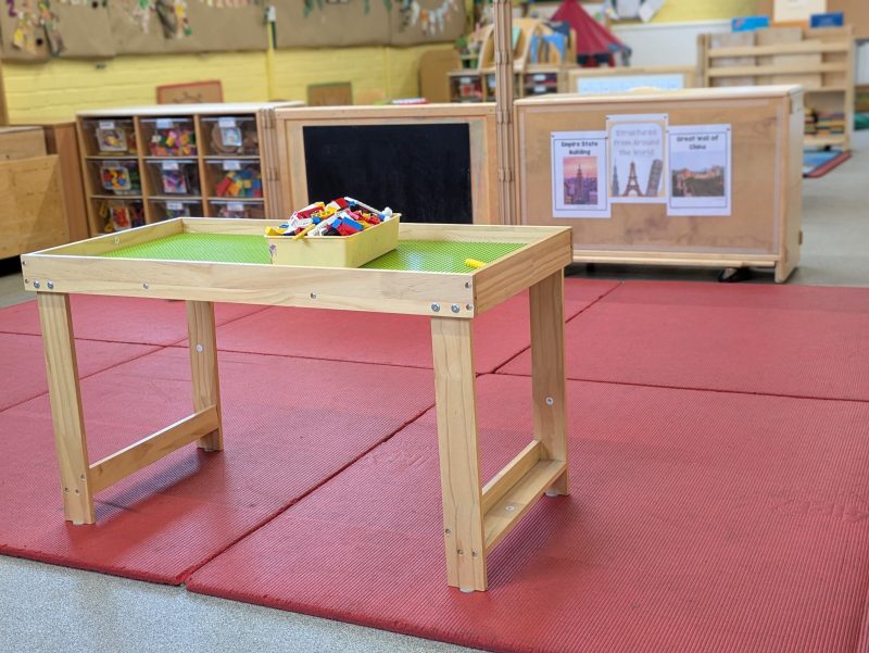 The construction table, set up with bricks